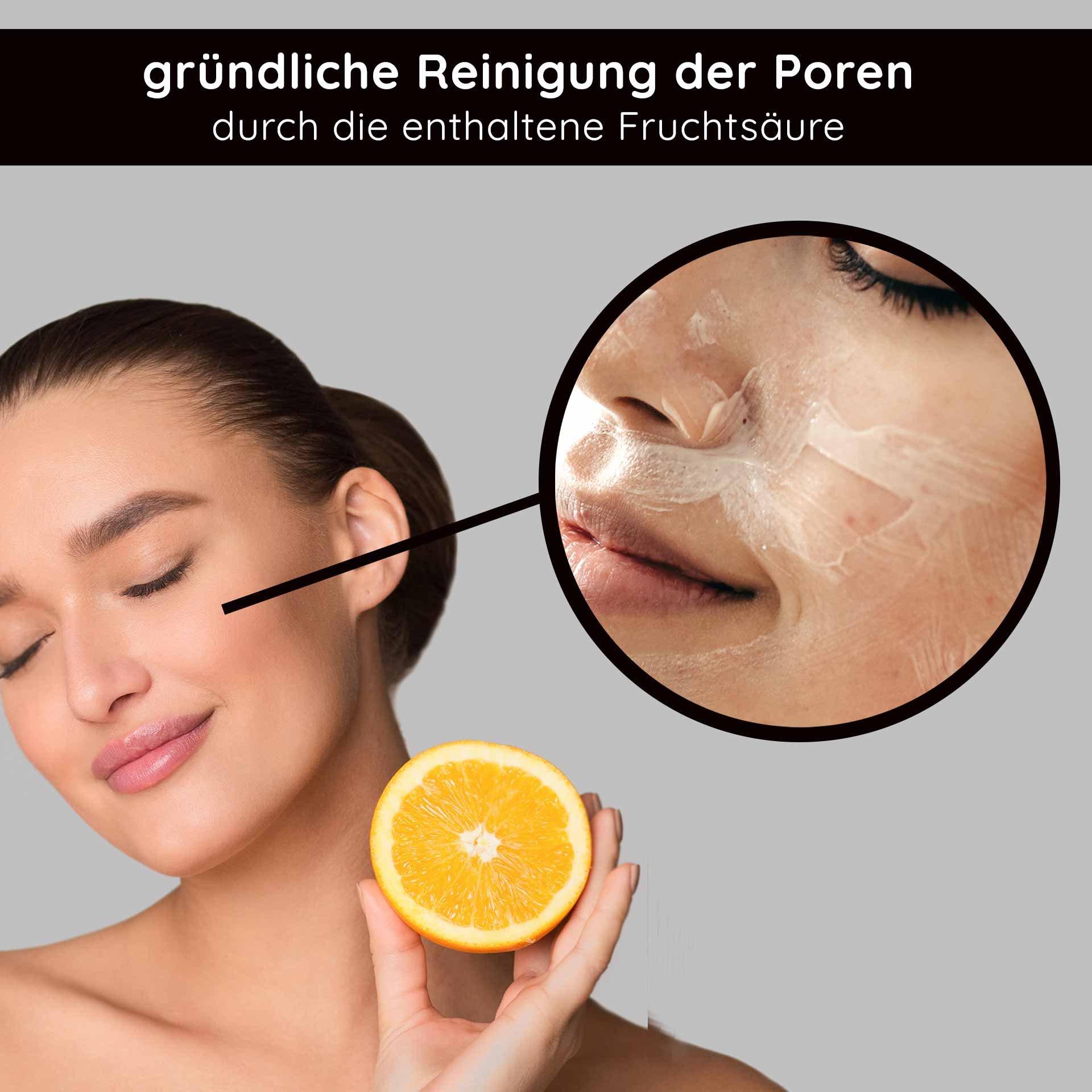 Mujer con cítrico naranja aplicando una limpieza facial con ácidos frutales, destacando la limpieza profunda de los poros.