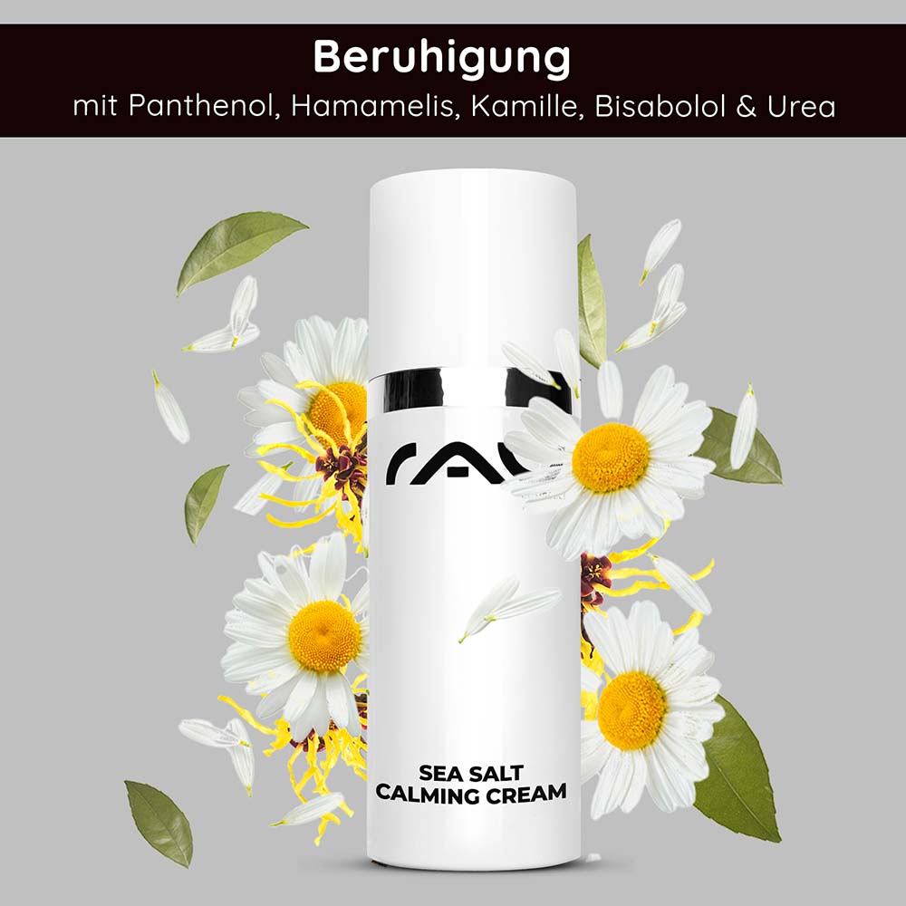 Sea Salt Calming Cream 50 ml face cream with sea salt Flasche der Sea Salt Calming Cream von RAU Cosmetics, umgeben von Kamillenblüten und -blättern, mit beruhigenden Inhaltsstoffen wie Panthenol, Hamamelis und Urea.